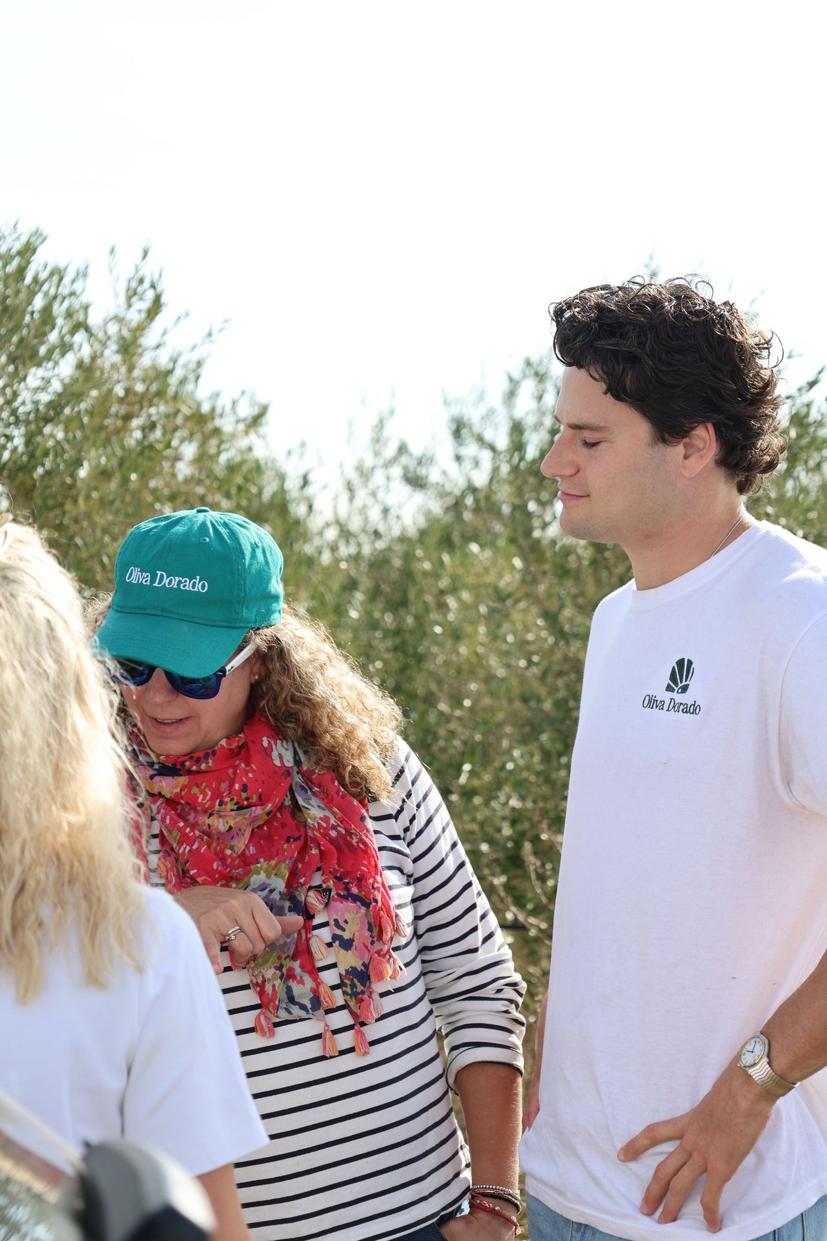 Jeremy with the family that owns the farm, in their olive grove